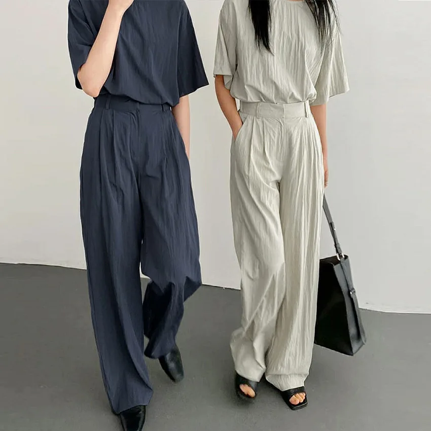 

The new summer leisure sports suit short sleeve wide leg pants long pants loose show thin hanging sense of commuting