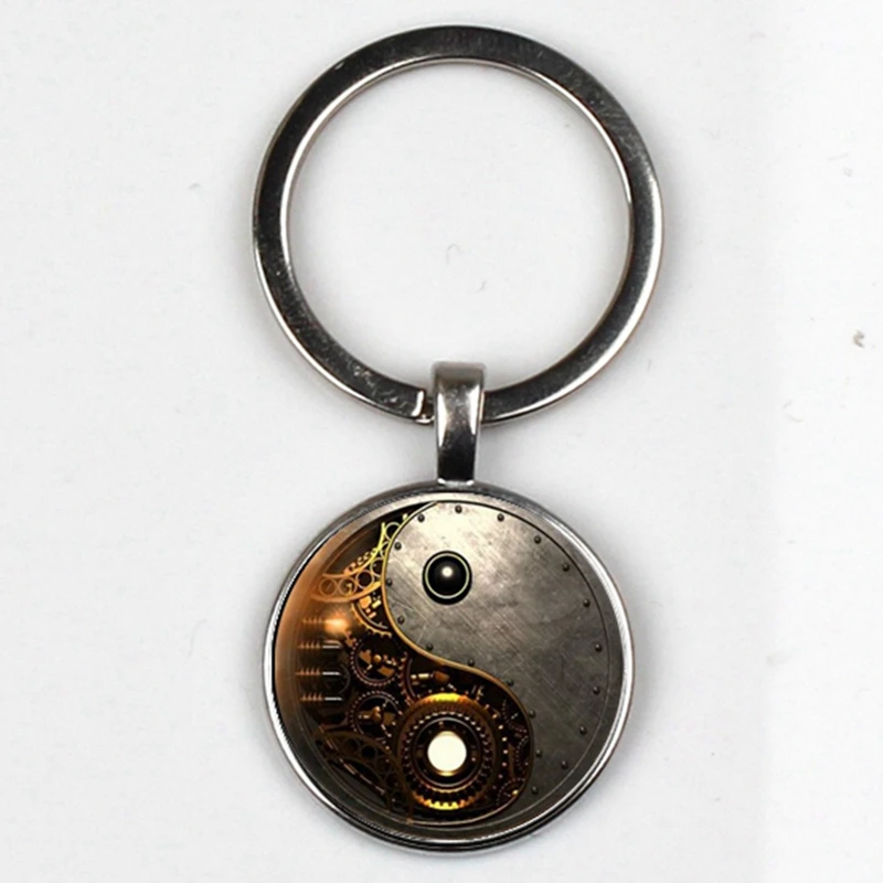 Брелок стимпанк Инь и Ян фото брелок тибетский серебро ретро кабошон стекло