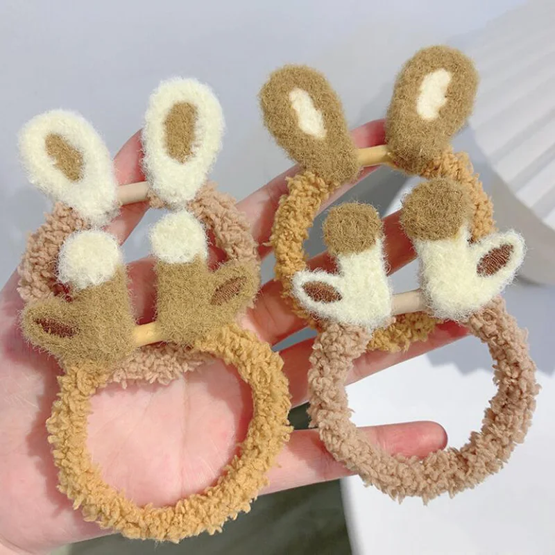 

Sheep sticky hair cute little hair rope milk tea color rubber band female head plush hair rope simple leather headdress female