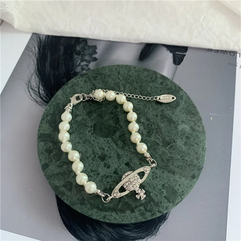 

Saturn Pearl Necklace For Women Retro Planet Short Charms Chain Necklace Female Wedding Jewelry Luxury Girls Birthday Gift 2021