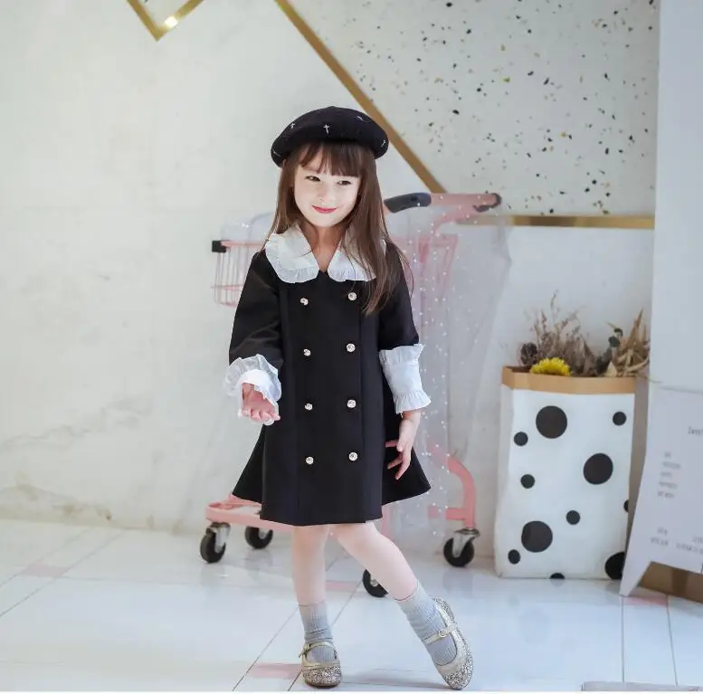 Черно-белое платье в стиле пэчворк 2019 г. Осенне-зимние двубортные платья с