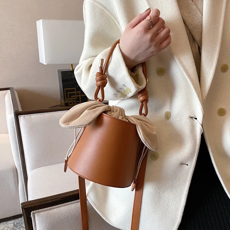 

Bucket bag design one-shoulder slant bow handbag girl with bag