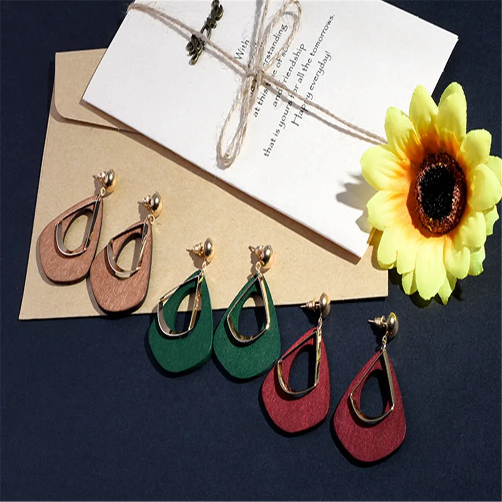 

European and American retro hand-made minimalist log alloy earrings, simple geometric exaggerated earrings, long wood earrings