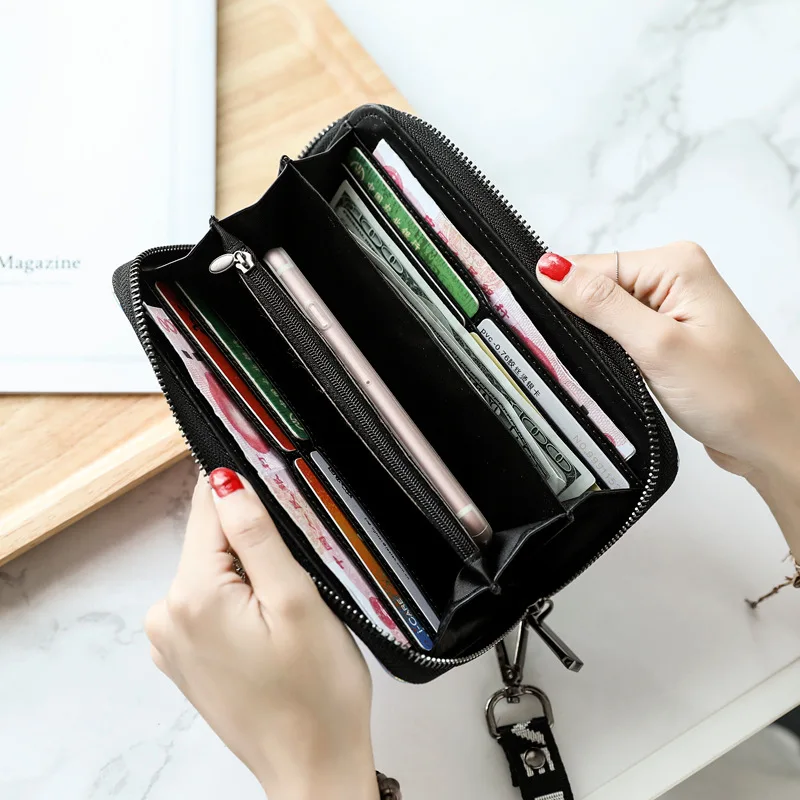 

Laser wallet female long section small fresh Korean version of the simple personality large capacity student zipper purse