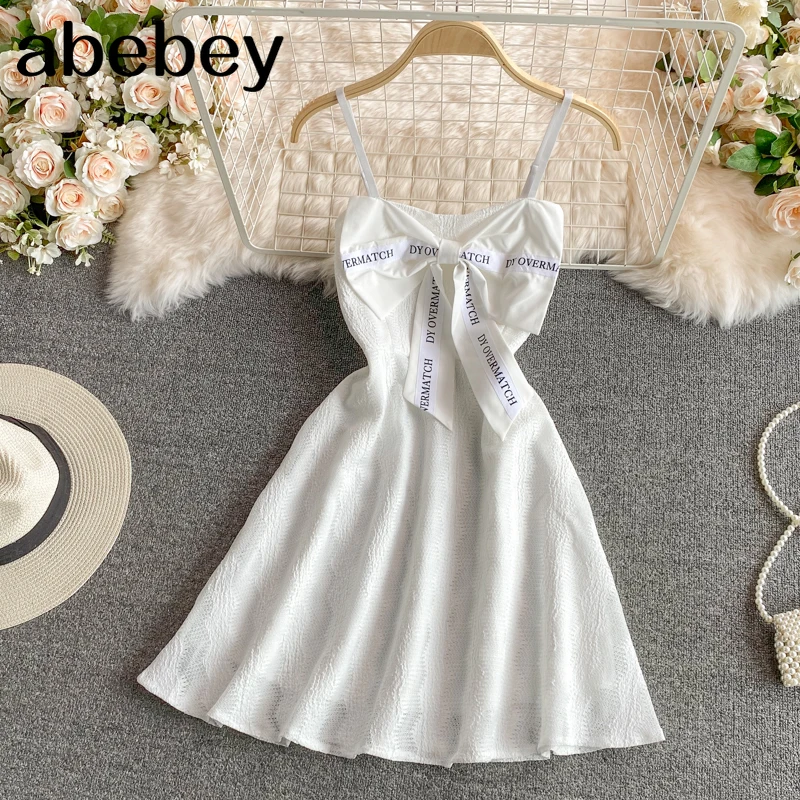 

2021 New Summer French V-neck sleeveless off shoulder Dress bow decoration high waist off back solid strap Dress