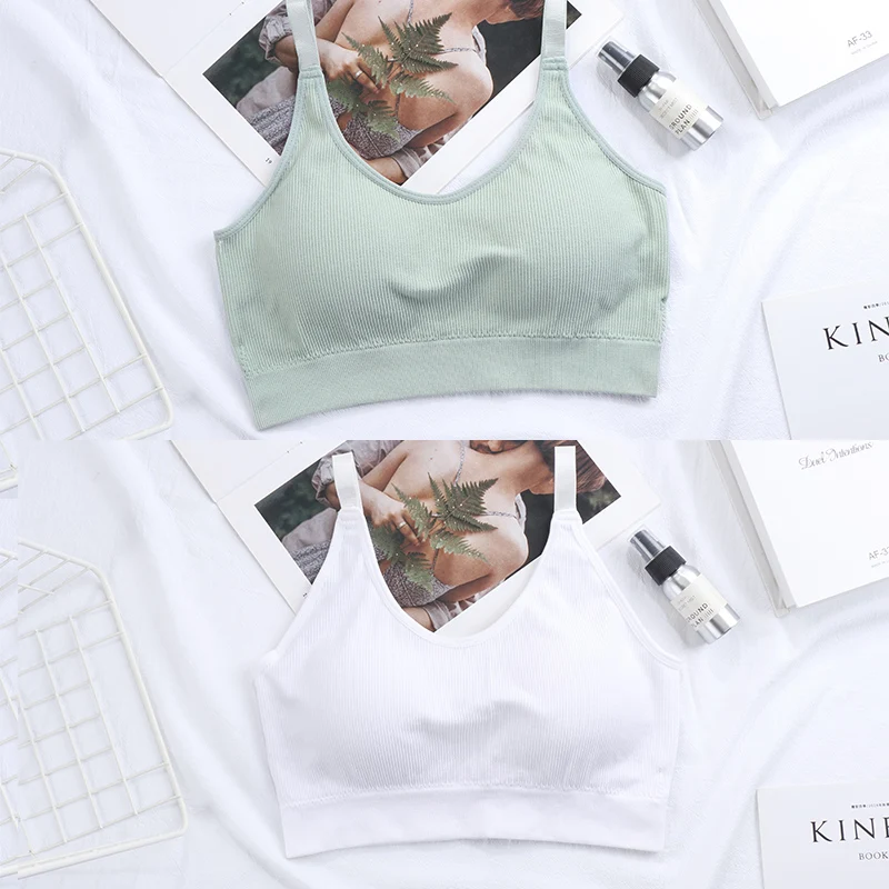 

High school girl's suspender, bra and sports vest