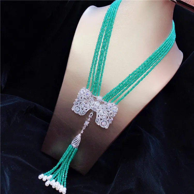 

Hand knotted multilayer noble white natural freshwater pearl green stone micro inlay zircon tassel necklace fashion jewelry