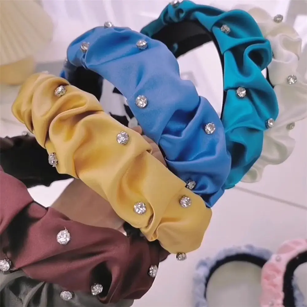 

Женская однотонная повязка на голову со складками