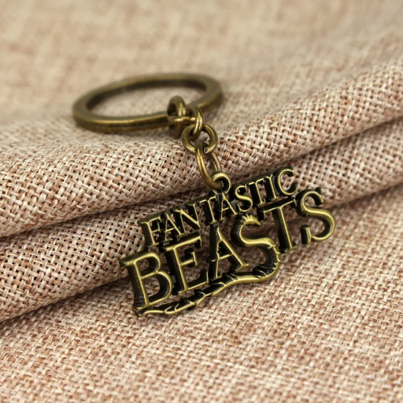 

Movie Jewelry Hogwarts School Fantastic Beasts Keychain Where to Find Them Keyring Letter Logo Metal Keyrings