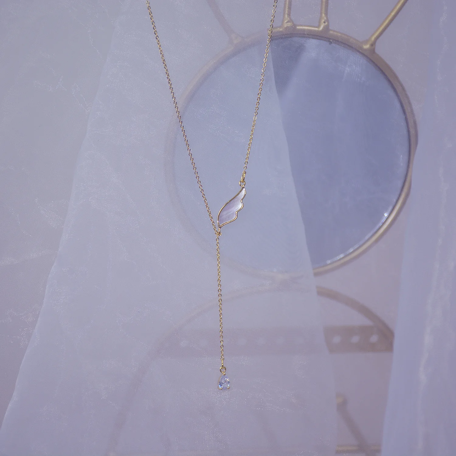 

Elegant Exquisite 14K Real Gold Exquisite Zircon Long Water Drop Natural Shell Wings Design Sense Necklace for Women