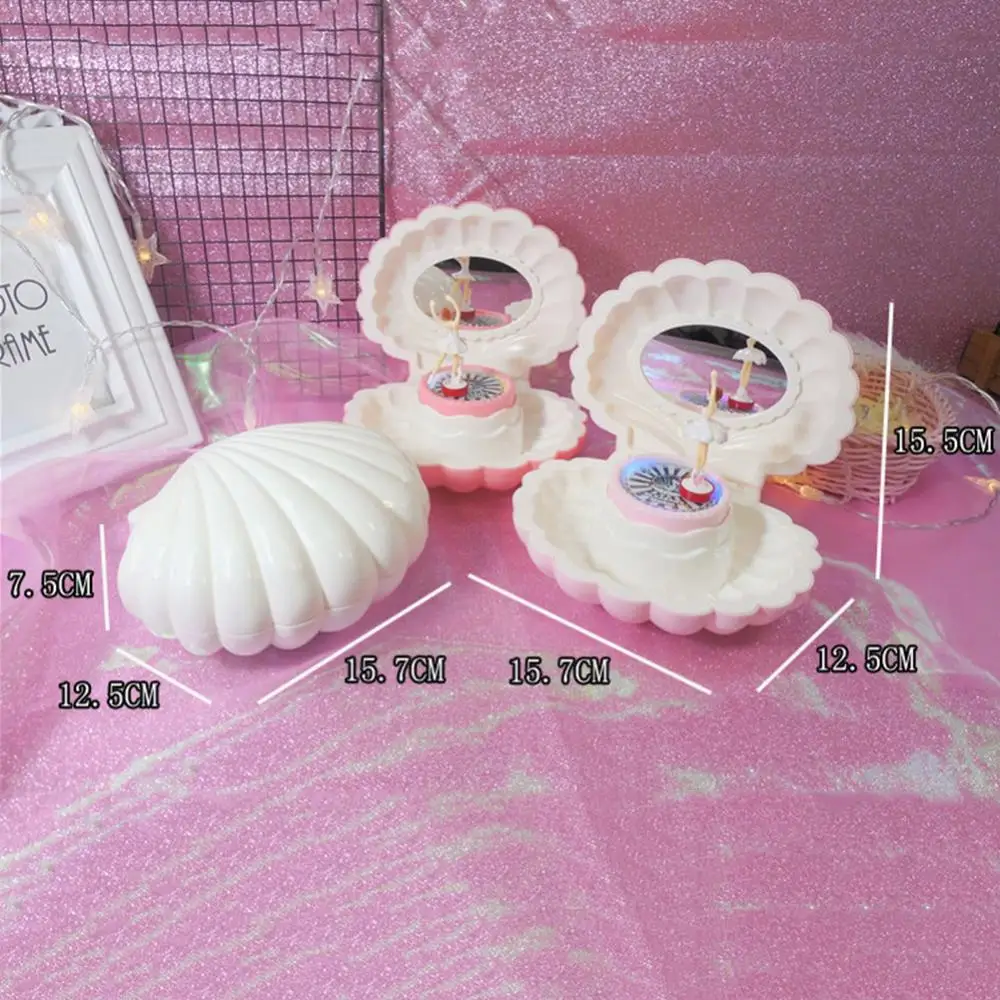 

Hot Sales Shell Shaped Rotating Girl LED Flashing Music Box Musical Toy Kids Xmas Gift