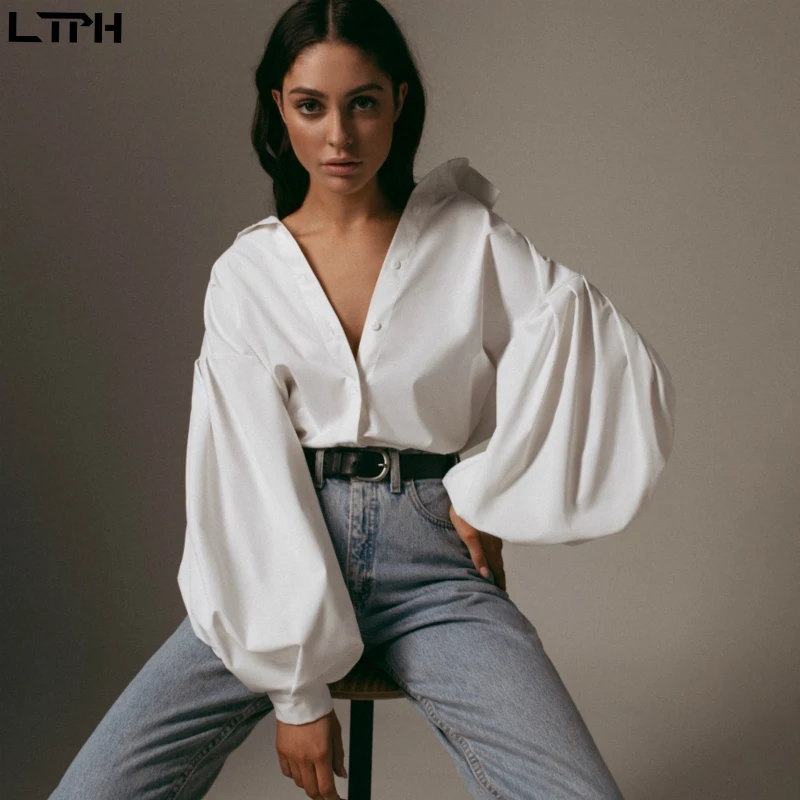 

Hot sale 2021 Autumn New women blouses Lantern Sleeves lapel Streetwear fashion Casual wild Loose Slim button simple Solid shirt