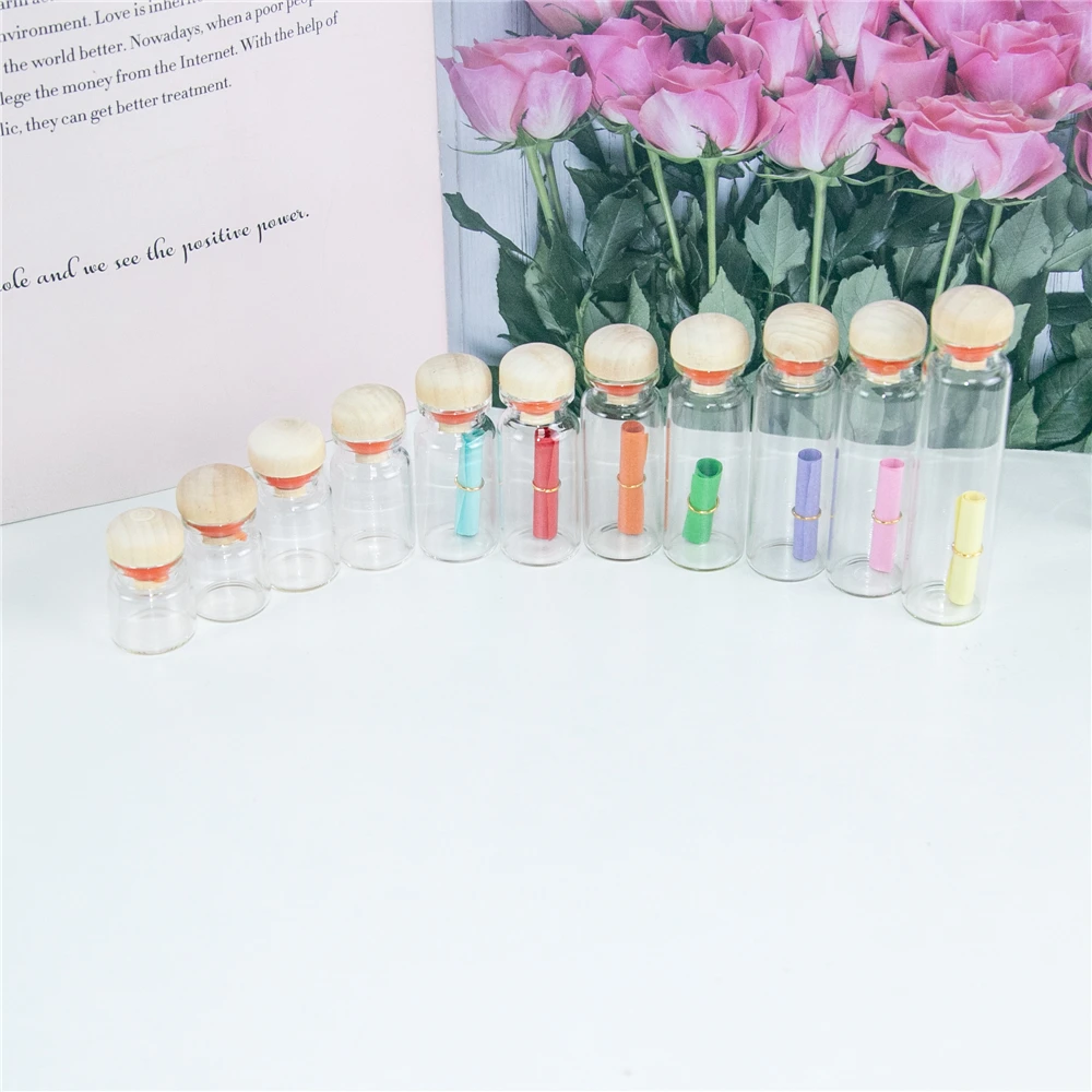 

Diameter 22mm Mini Clear Glass Bottles Pendants With Wood Stopper Gifts Jars Empty Cosmetics Perfume Vials Jewelry 100pcs