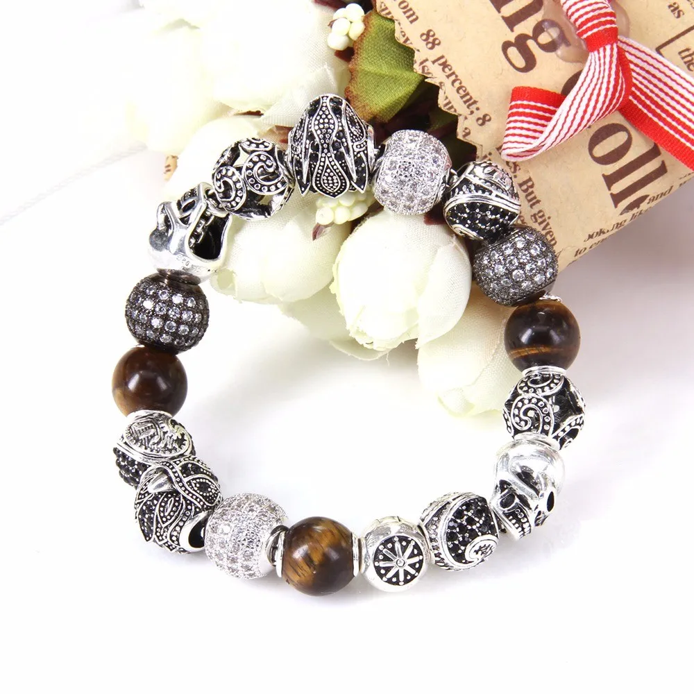 Браслет из бусин Thomas Style KM с орлом тигровым глазом совой черепом маори бусинами