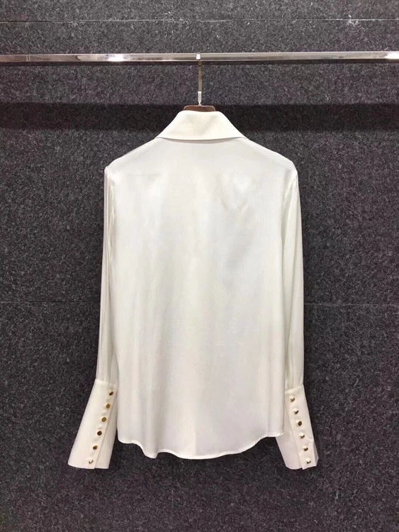 

2021 early spring new women's pointed lapel solid color decorative long-sleeved button shirt 106