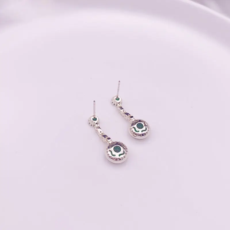 Дизайнерские оригинальные новые темпераментные серьги с изумрудно-зелеными