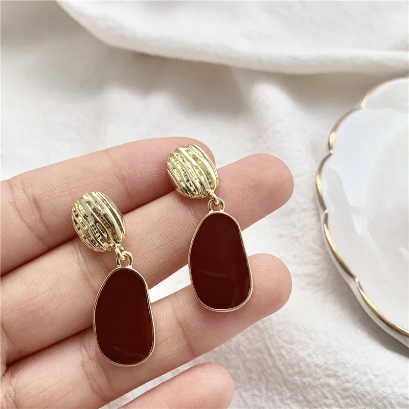 Модные темпераментные нишевые глазурные серьги-капельки геометрические