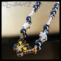 sexmara 2021 new stugazi hip hop punk personality pendant black white pearl enamel butterfly necklace for men women girl jewelry