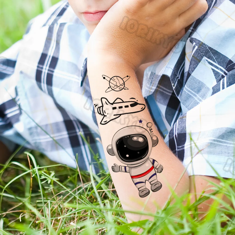 

Airplane Spaceman Temporary Tattoos For Kids Face Neck Boy Girls Adult Fake Planets Astronaut Tattoo Sticker Black Cartoon Tatoo