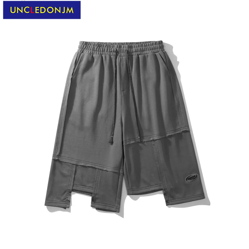 

UNCLEDONJM Irregular stitching casual shorts men's summer high street loose Knee Length streetwear men shorts sweatshorts U2221