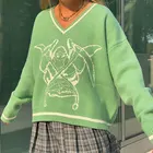 Женский трикотажный свитер с V-образным вырезом и принтом