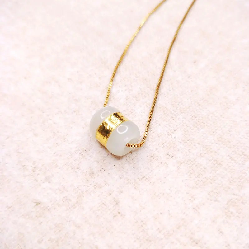 

Natural Hetian Jade Bead Pendant gold inlaid with jade fu Pendant suitable for female gift