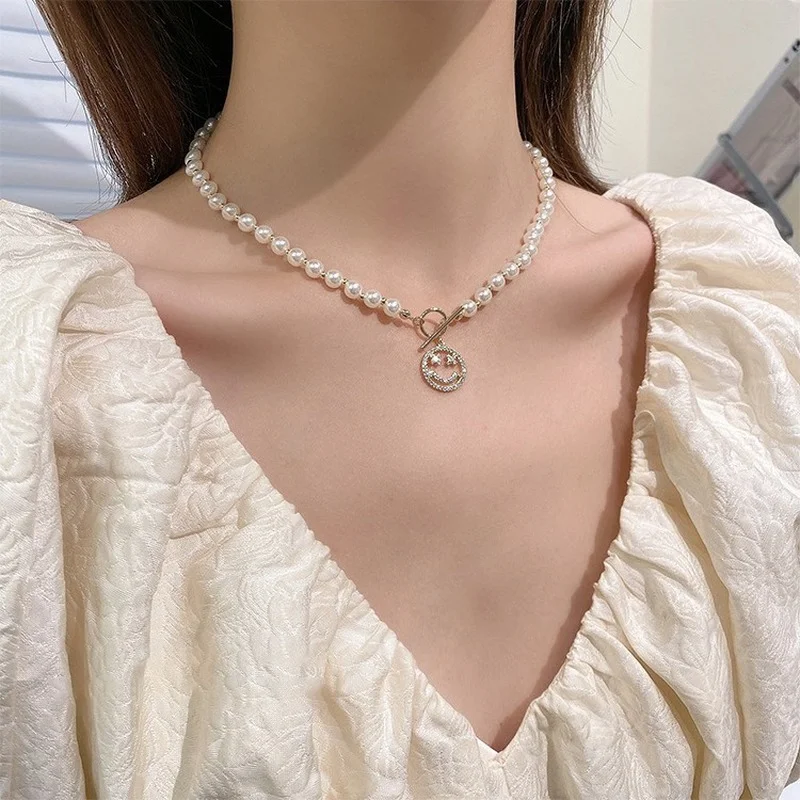 

U-Magical Shining CZ Zircon Smile Face Imitation Pearl Pendant Necklace for Women Hollow Beaded Toggle Clasp Necklace Jewelry