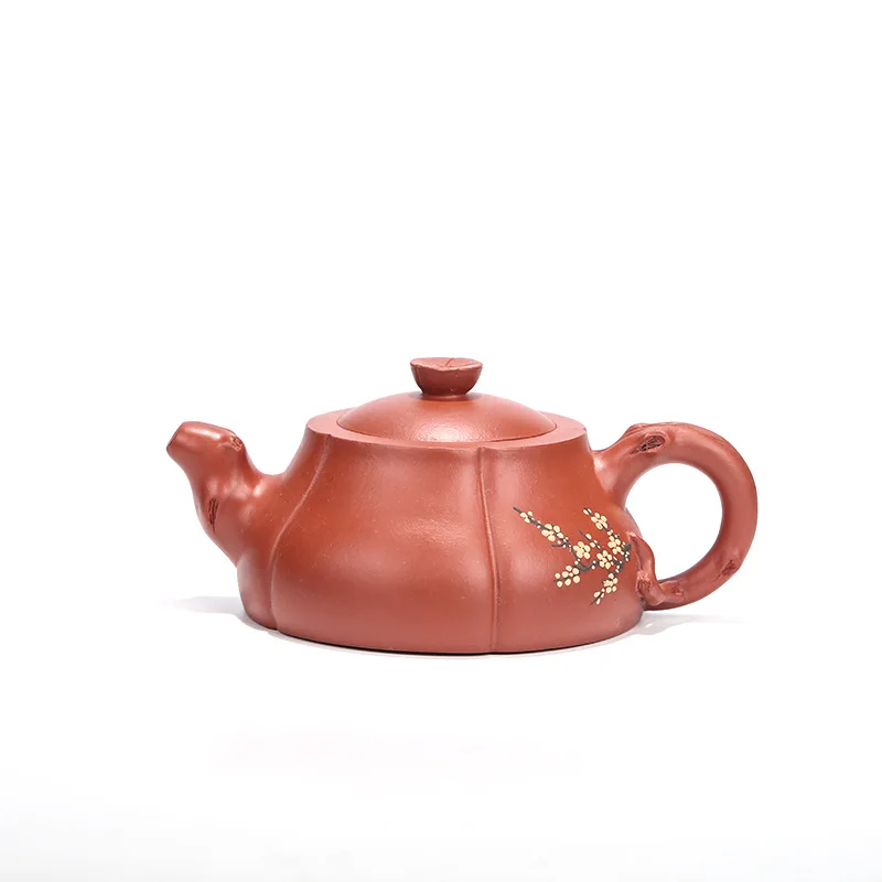

Yixing raw purple clay pot is completely hand-painted vermilion pile pot