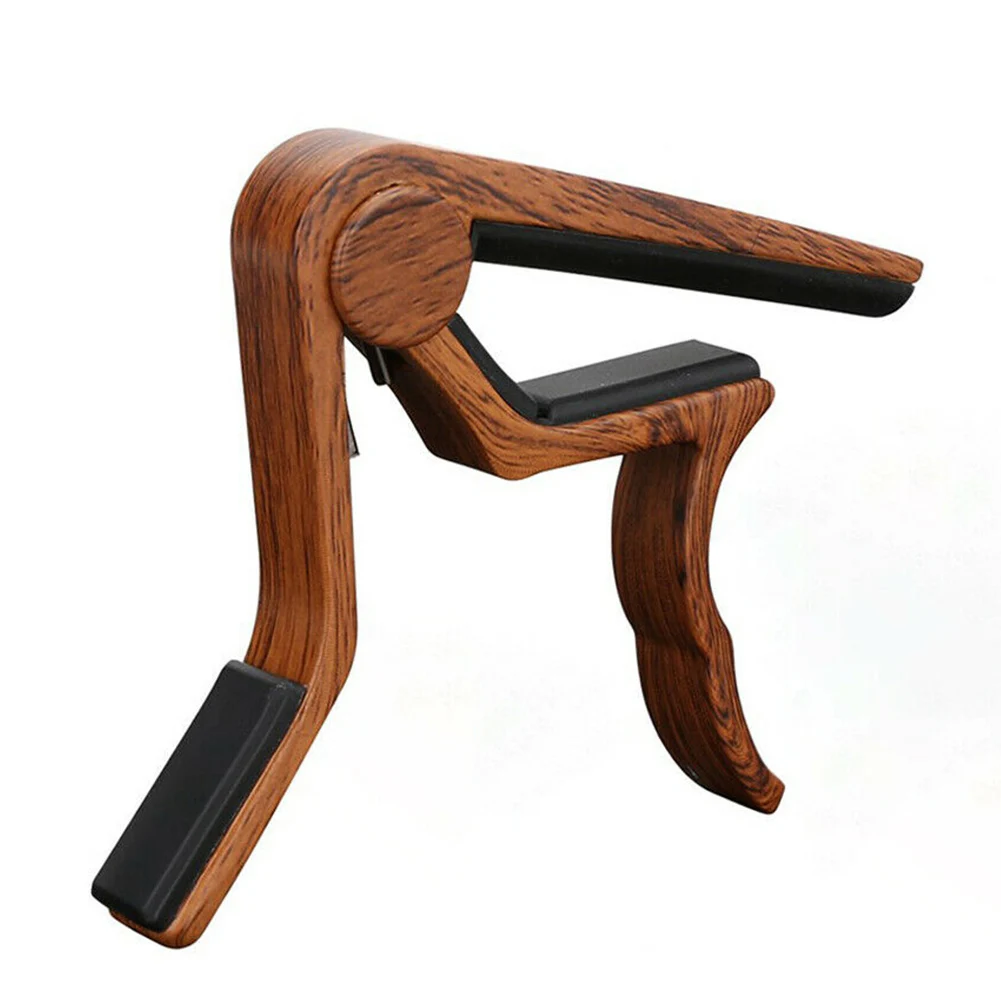 

Wood grain metal guitar capo, with perfect silicon pad, can be used for guitar ukulele music instrument accessories guitar clip