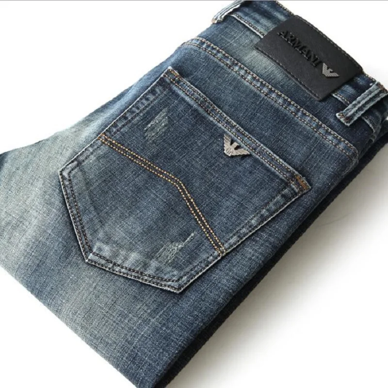 

Новые осенние мужские джинсы, облегающие эластичные брендовые модные деловые брюки с итальянским орлом, классические стильные зимние хлоп...