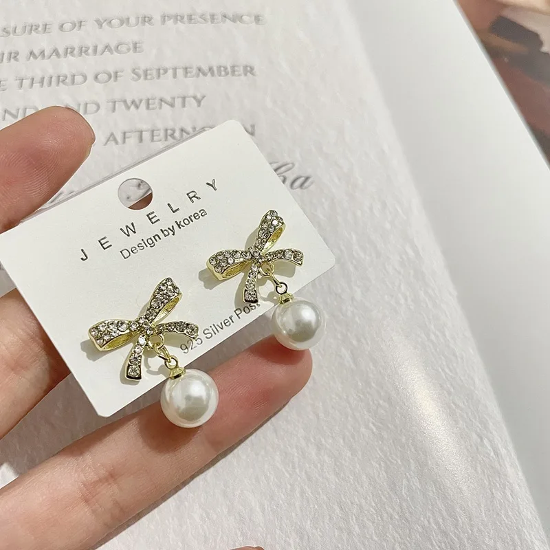 

New S925 Silver Needle Bowknot Pearl Temperament Earrings Female Trendy Fashion Simple Design Diamond Earrings Jewelry