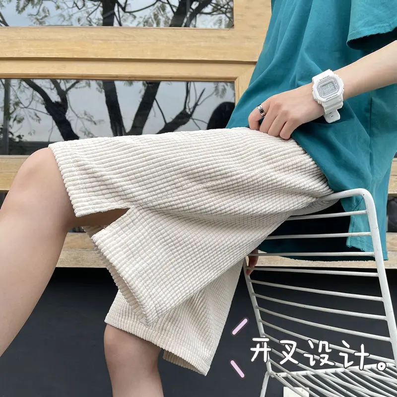 

Men's casual shorts 2021 summer new corn grid split loose wild five-point pants trend sports fashion campus youth men's clothing