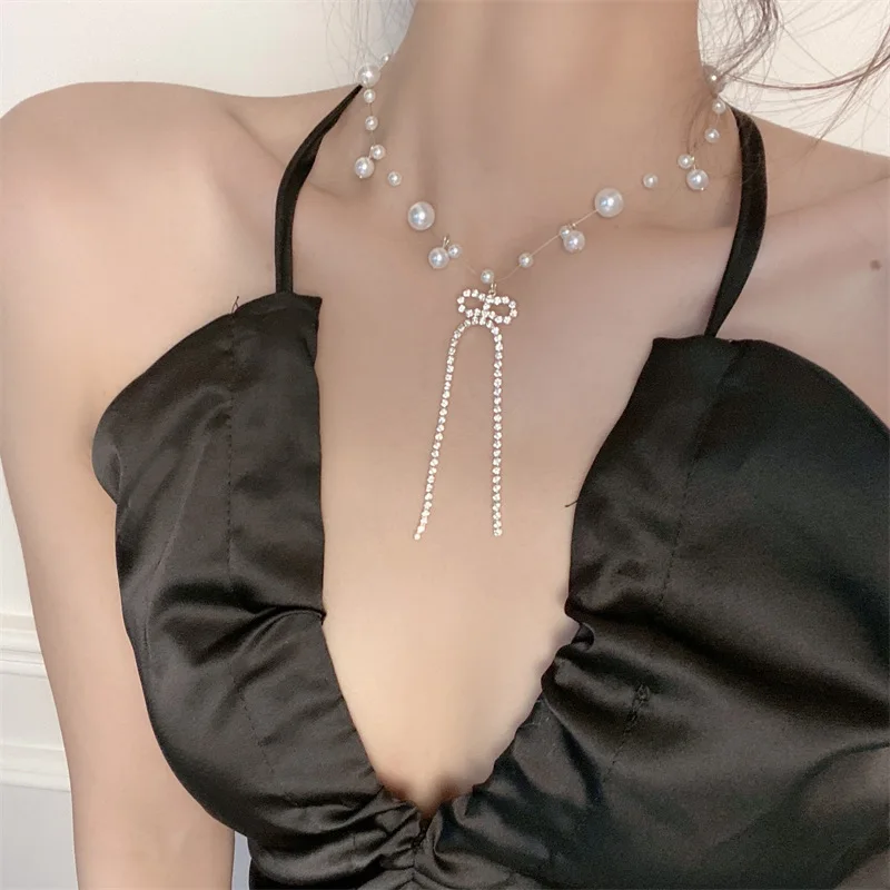 

ALLNEWME Dainty Full Bling Bling Rhinestone Bowknot Pendant Necklace for Women Ladies Simulated Pearl Chokers Necklace Jewelry