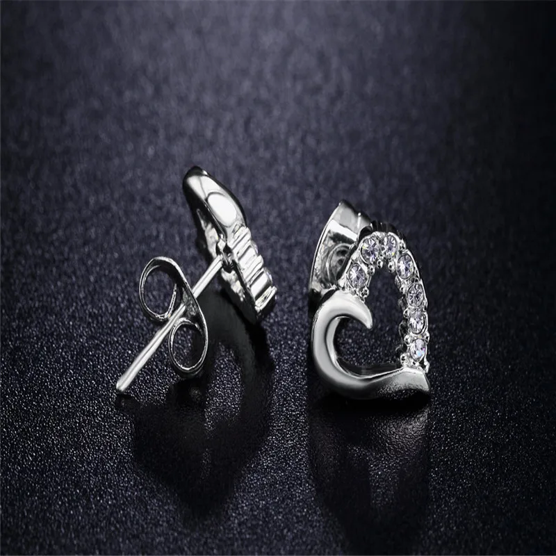 Женские серьги-гвоздики из розового золота с фианитами