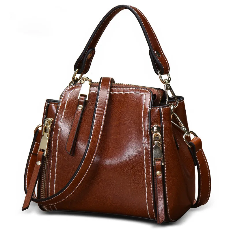 

2021 new Korean version of real cowhide handbags retro solid color messenger bag bucket bag ladies fashion one-shoulder handbag