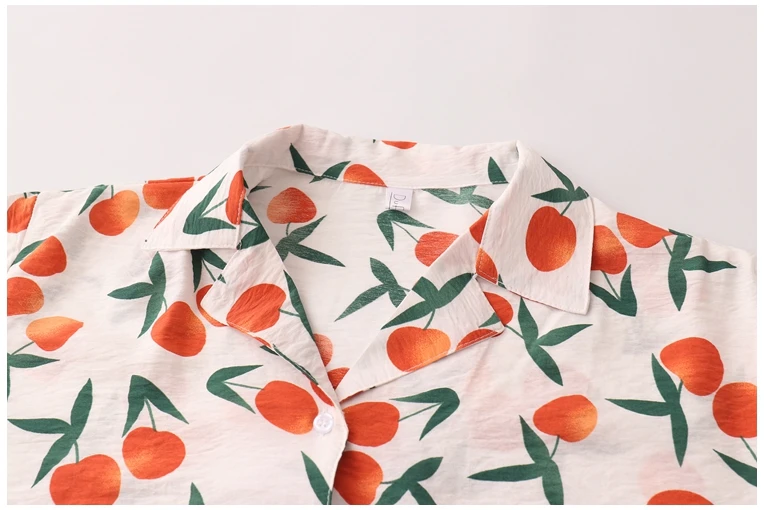 

Summer new style Korean holiday style small fresh fruit print loose short-sleeved V-neck shirt