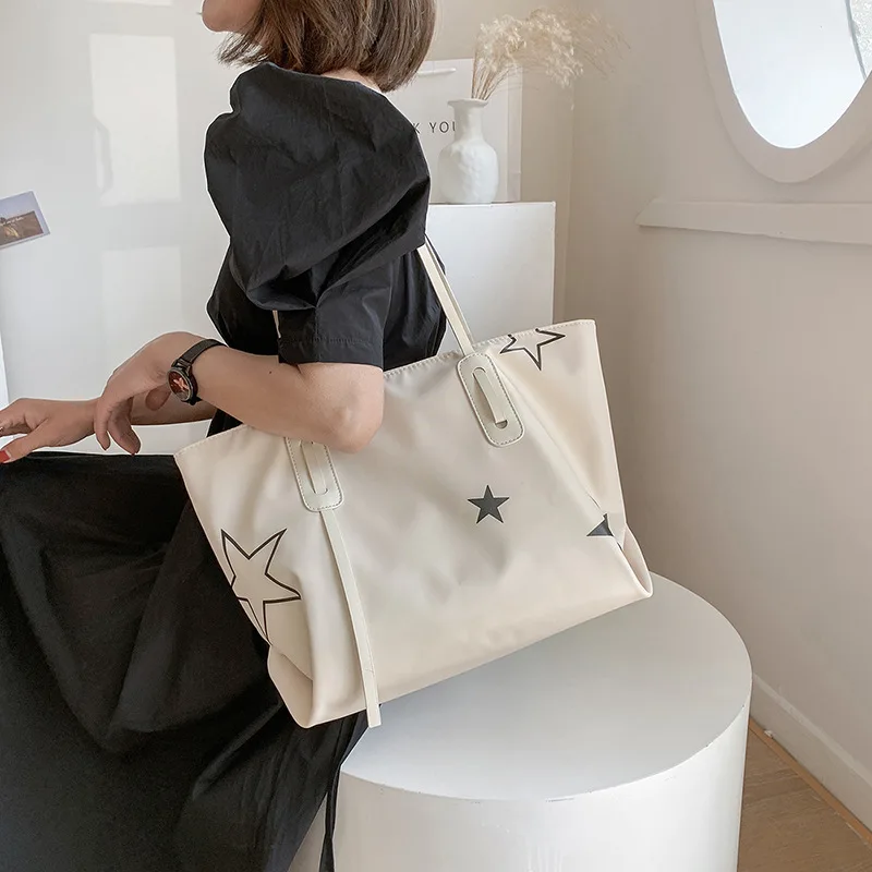 

Bag women's bag 2021 autumn new high-capacity tote bag women's trend simple armpit single shoulder bag