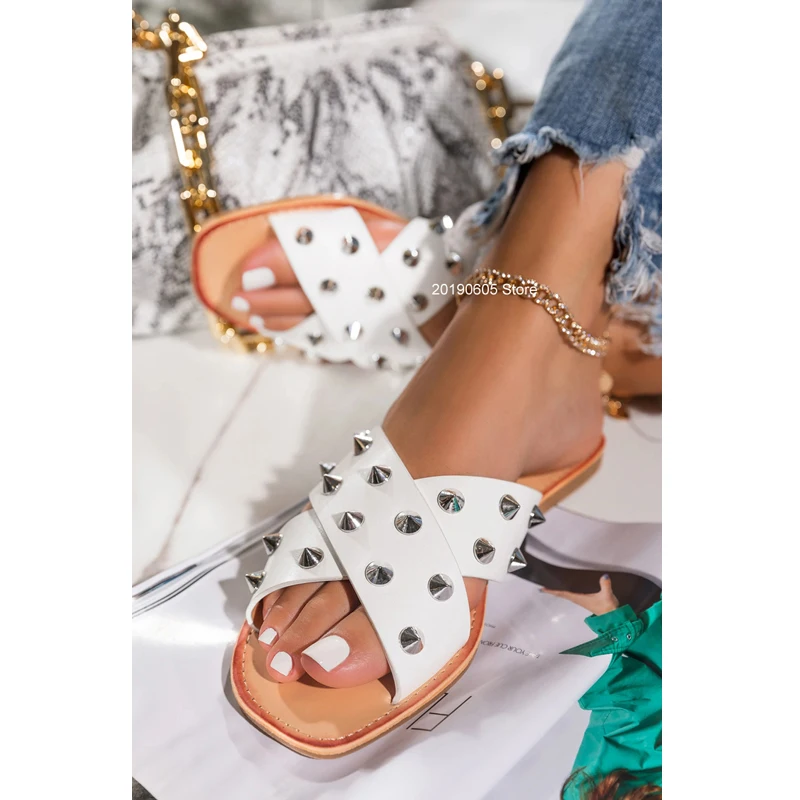 

Fashion sexy roman style cross rivet outdoor 2021 summer new female slippers Solid color flat bottom large size beach slippers