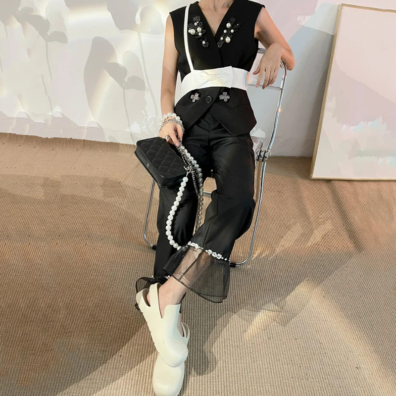 

[EAM] Women Loose Fit Black Nailed Bow Spliced Irregular Est New V-collar Sleeveless Fashion Tide Spring Summer 2021 1DE0536