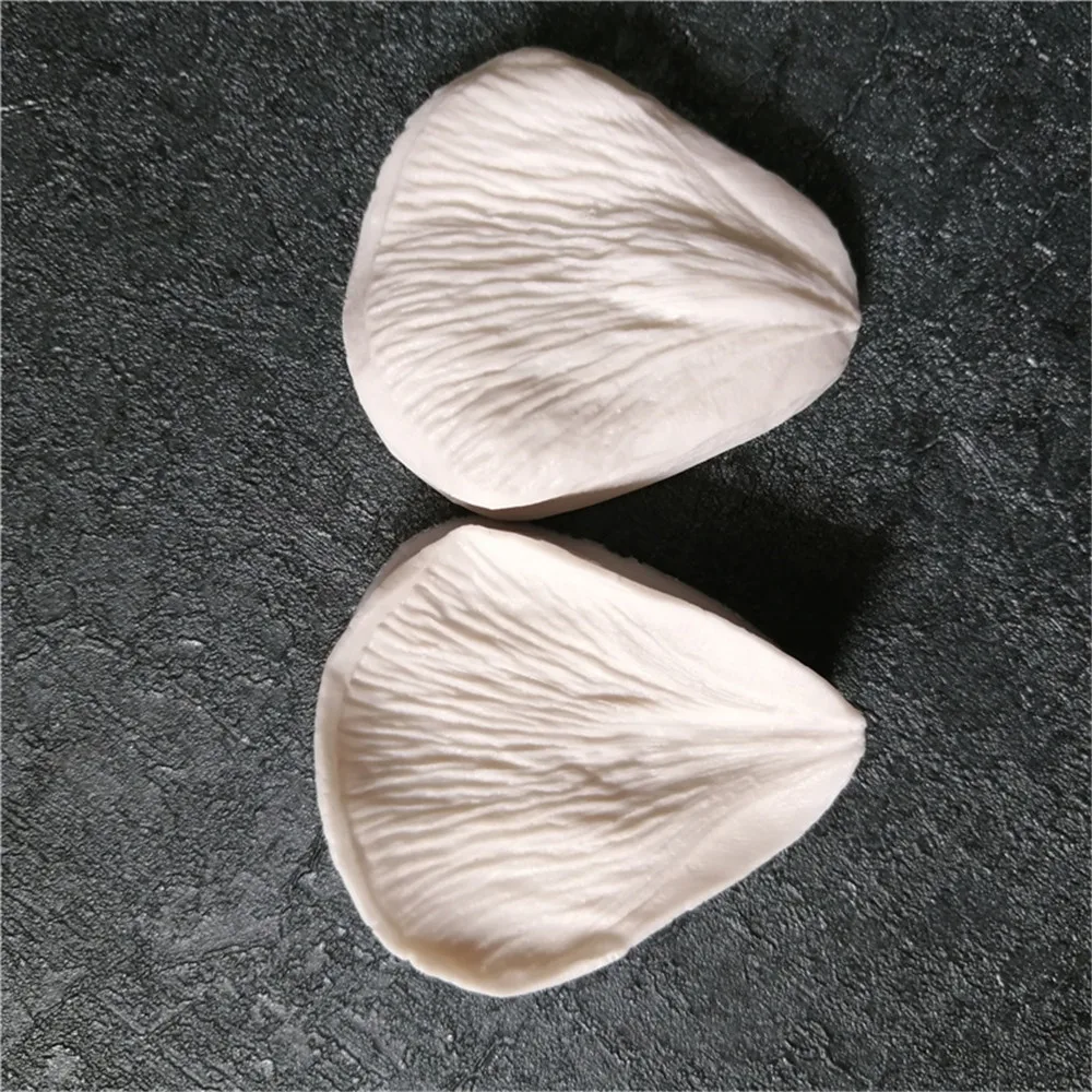 Формы из силиконовой глины имитируют узоры в виде цветов и яиц вены