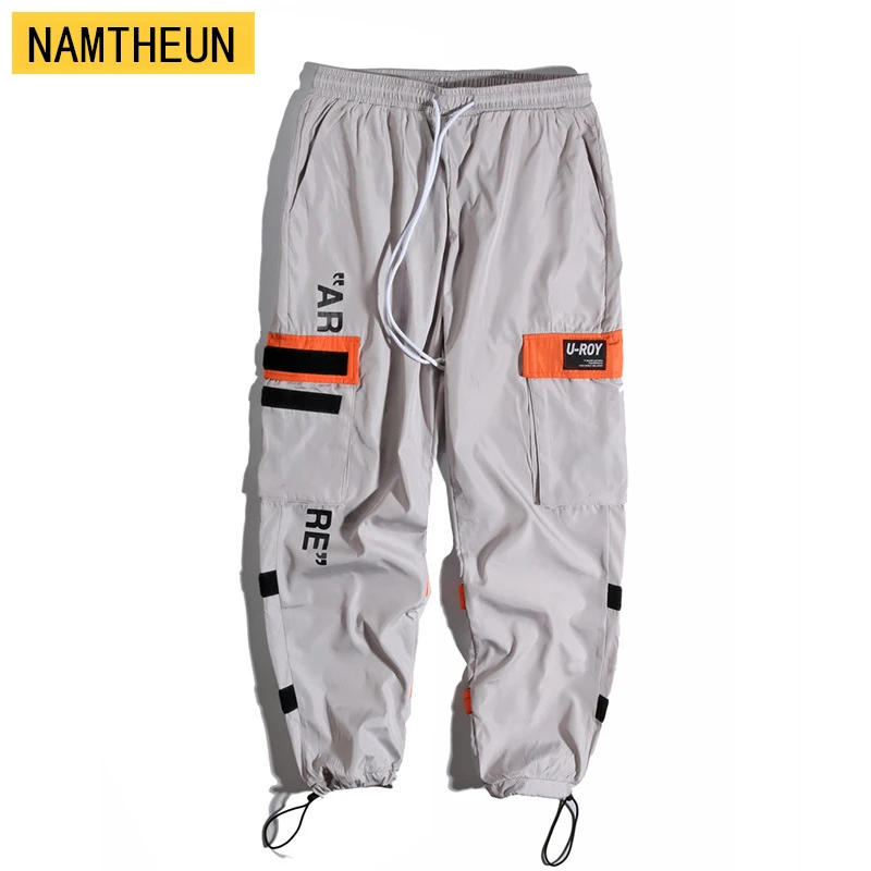 

2020 Spring and autumn casual overalls men trend ins hip hop Japanese streetwear sports pants drawstring high quality pants