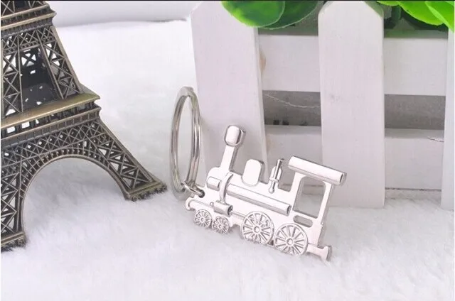 

FREE shipping by FEDEX 100pcs/lot 2014 Wholesale Zinc Alloy Locomotive Keyring Metal Vintage Train Pendant Keychain