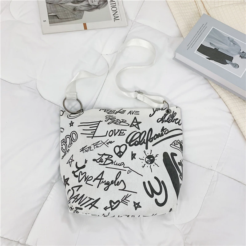 

Women's Canvas Trend Large Capacity Shopping Bag Shoulder Bag Fashion Letter Ribbon Messenger Bag