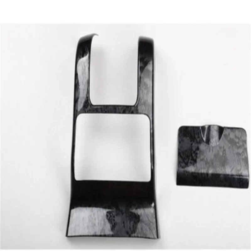 

The modified mahogany interior and the air outlet guard plate 2pcs carbon fiber sticker for Volvo S60 2014-2018 on the left-