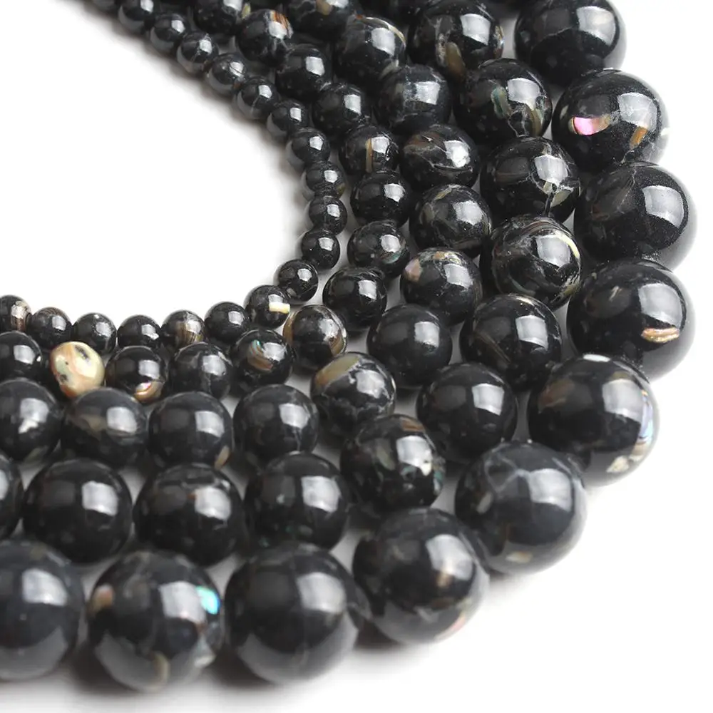 Круглые бусины из натурального черного говлита незакрепленные для изготовления