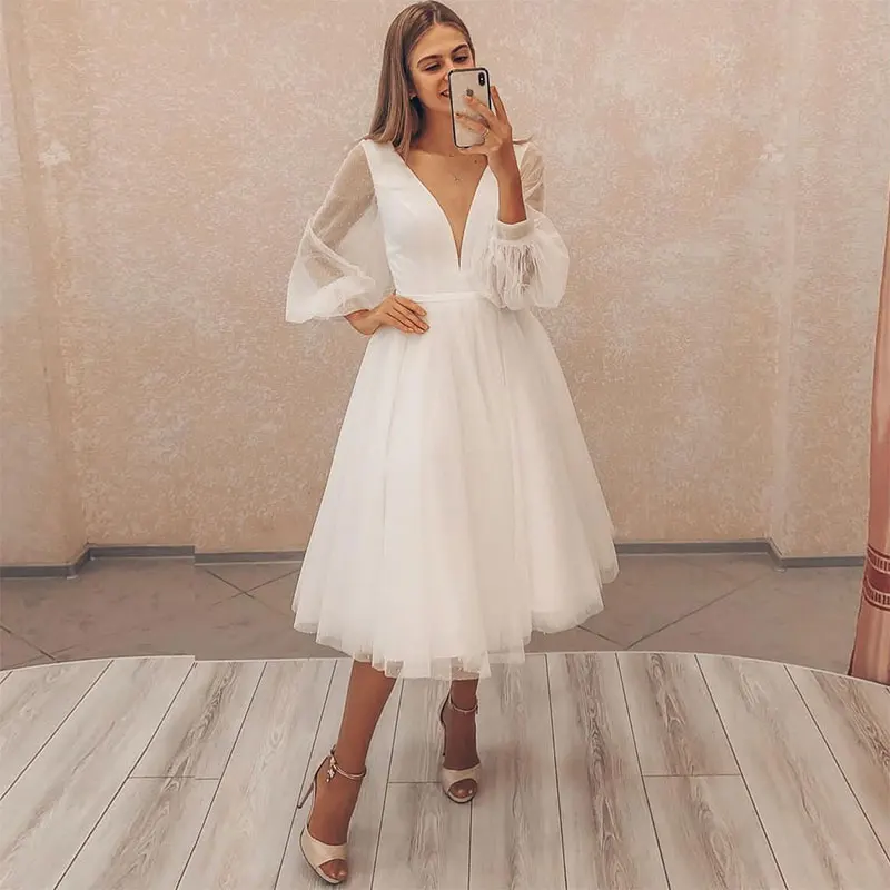 Кружевное платье с длинным рукавом