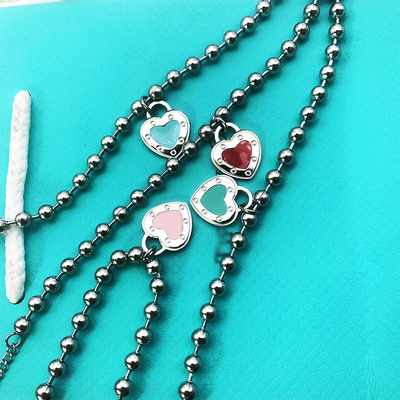 

Heart Bracelets for Womens Stainless Steel Couple Beads Chains Bracelet Fashion Blue Green Pink Red Bracelet on Hand Wholesale
