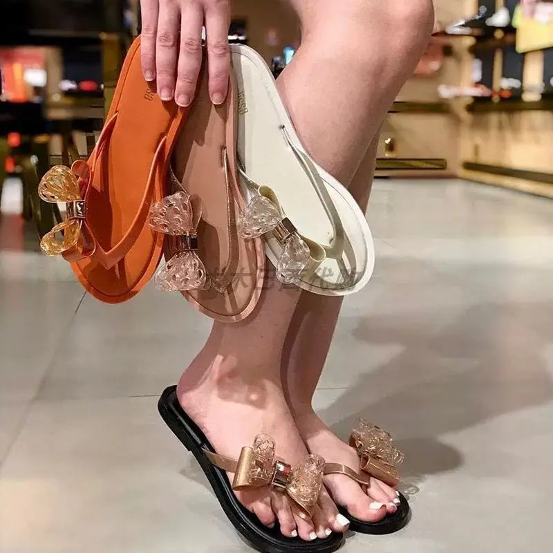 Новинка 2021 года Стильные женские тапочки с бантиком Модная пляжная обувь для