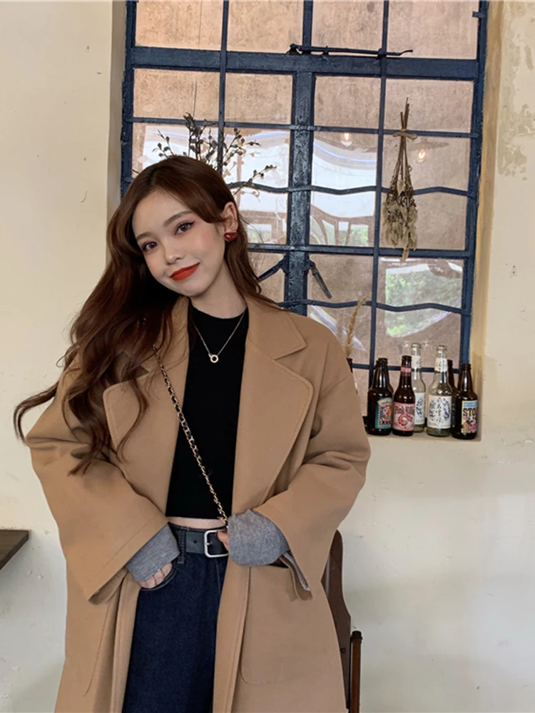 

2020Korean version of the spring style simple wild loose belt belt split woolen coat