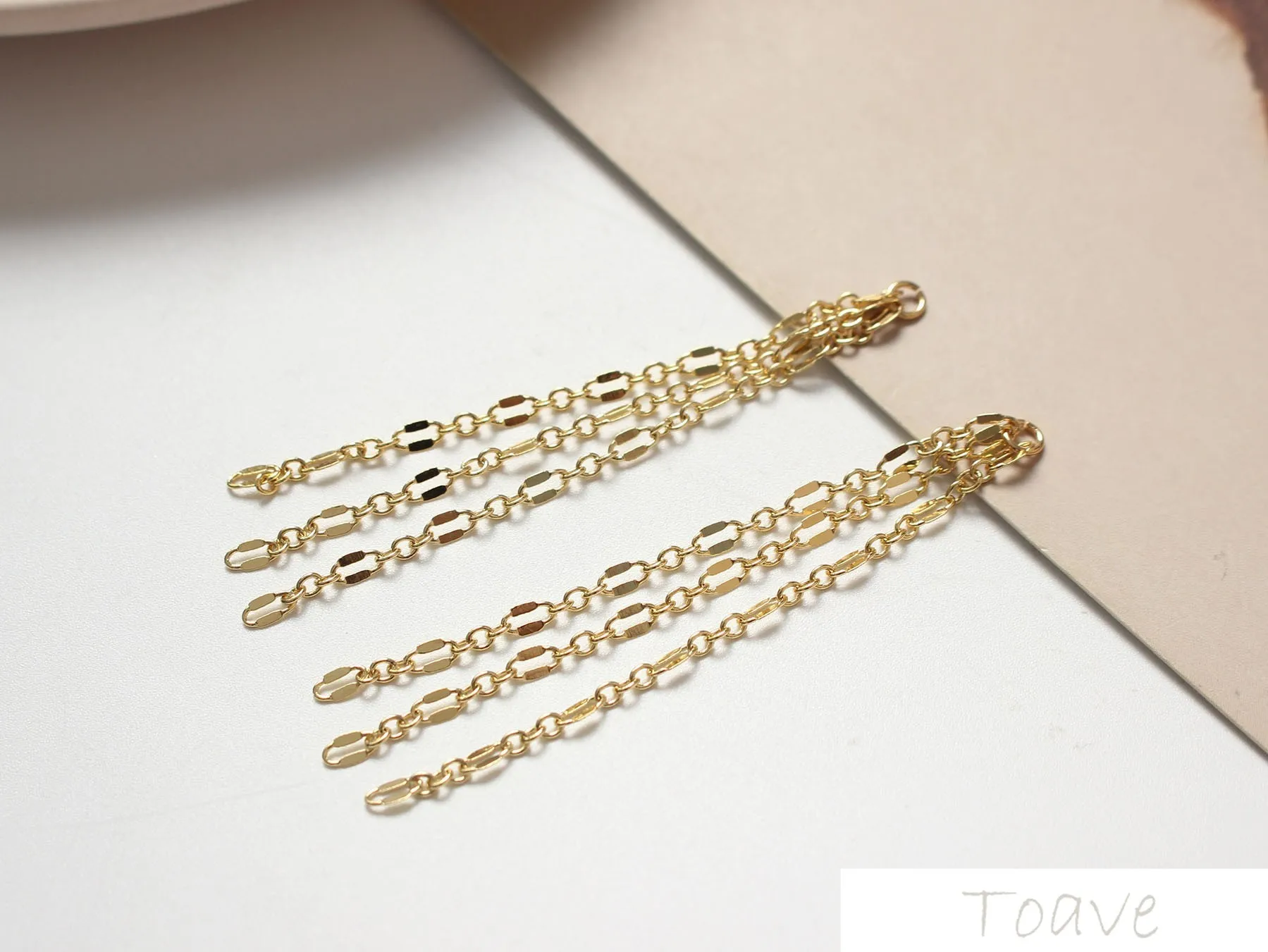 Baxter мигание цепь кисточкой покрытая медью 18K Настоящее золото ухо arteth материал